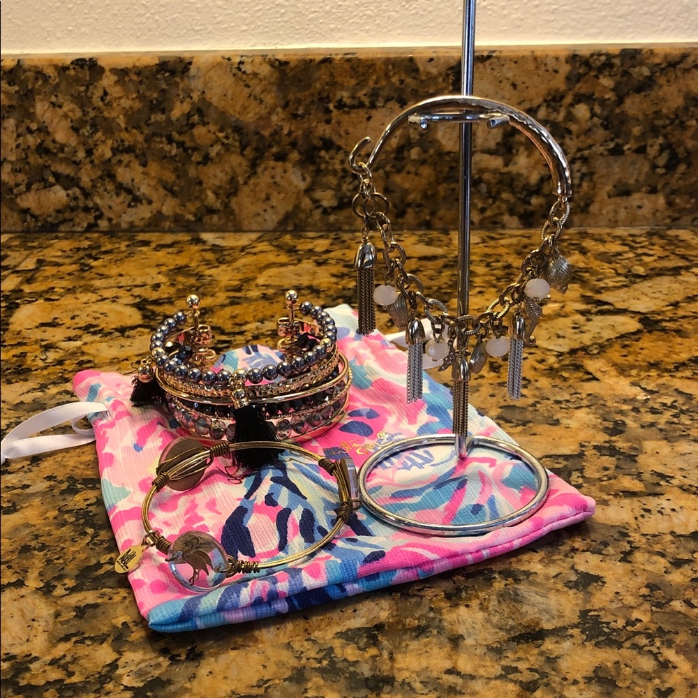 Bundle of two Lilly bracelets & one other mirrored Bracelet with Lilly Bag